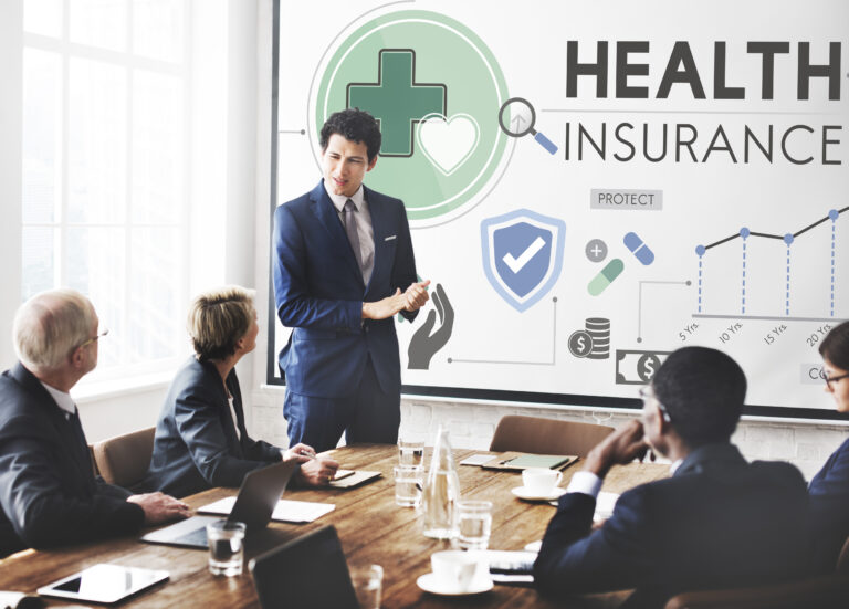 Business team discussing top health insurance payers in 2025